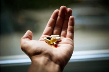 Photo of pills on the hand